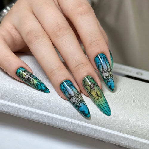 Artificial nails in elegant stiletto design with elaborate motifs Bowlift