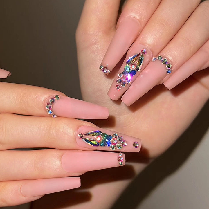 Artificial nails with rhinestone embellishments Bowlift