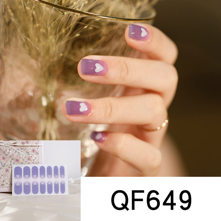 Artificial nail art with heart-shaped designs and soft color gradients Bowlift