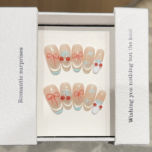 Artificial nail tips with romantic bow and cherry motifs Bowlift