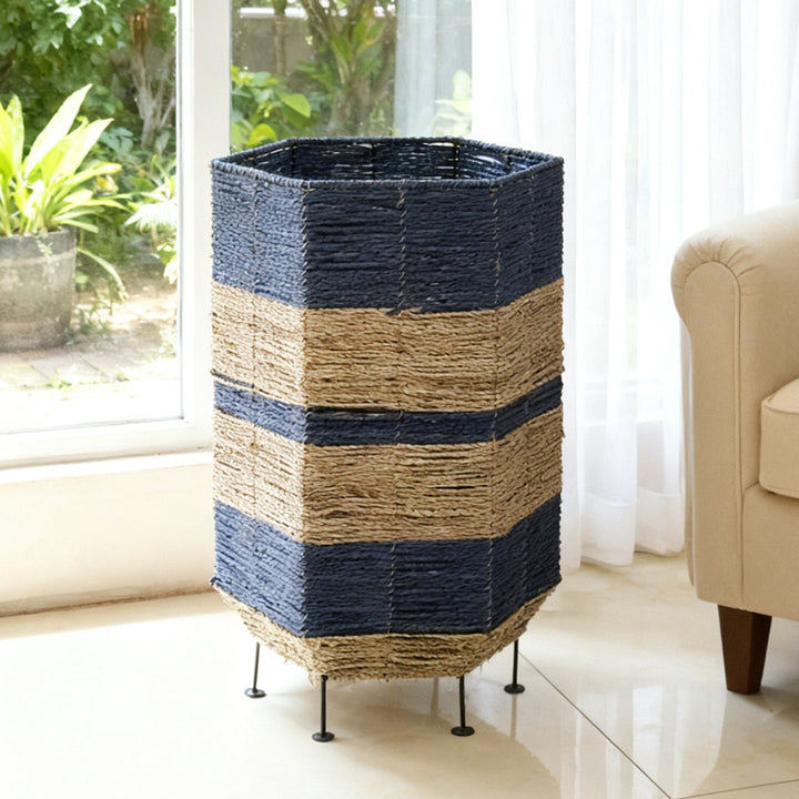 Stylish laundry basket made of rattan with metal legs Bowlift