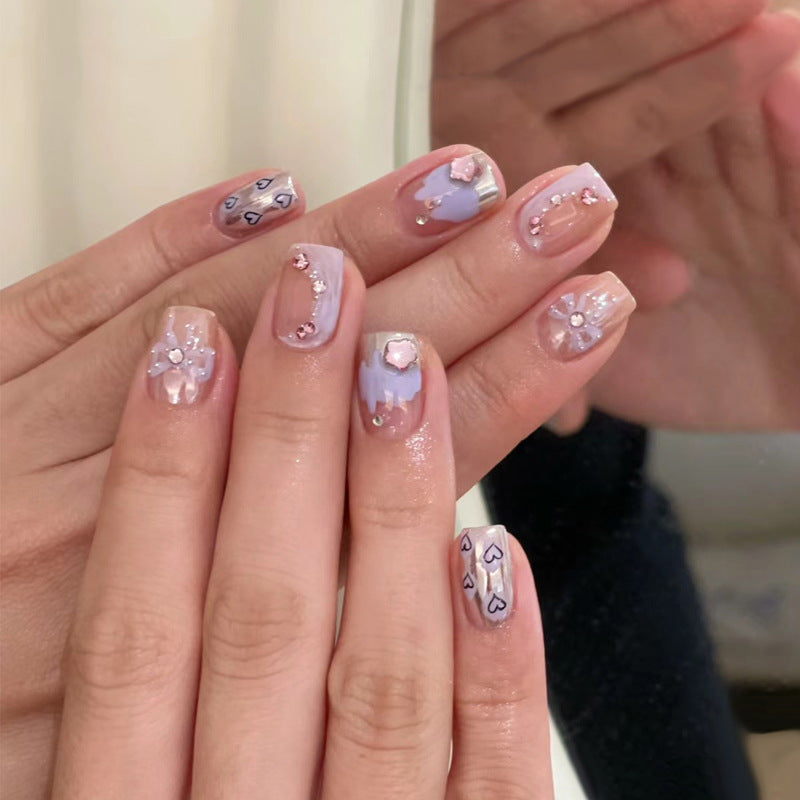 Artistic Press-On Nail Set with Floral and Heart Designs Bowlift