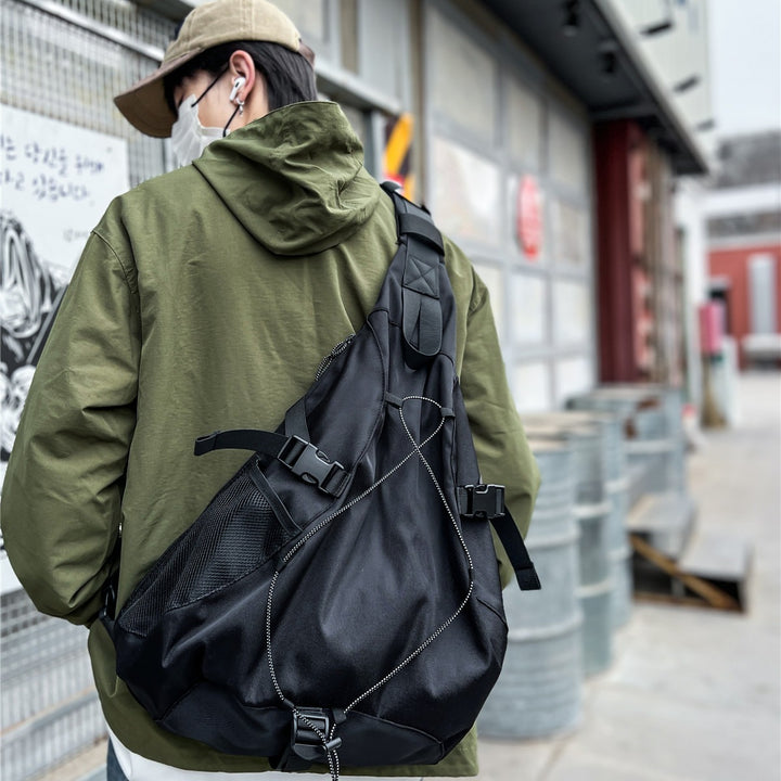 Sporty sling backpack with adjustable straps and practical organizer Bowlift