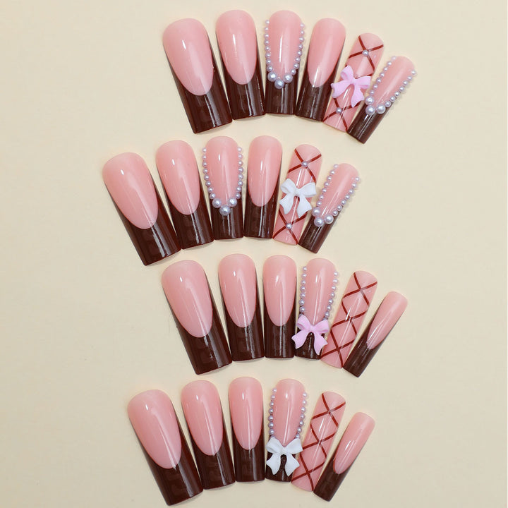 Artificial nail set with stylish 3D bow details and elegant shine Bowlift