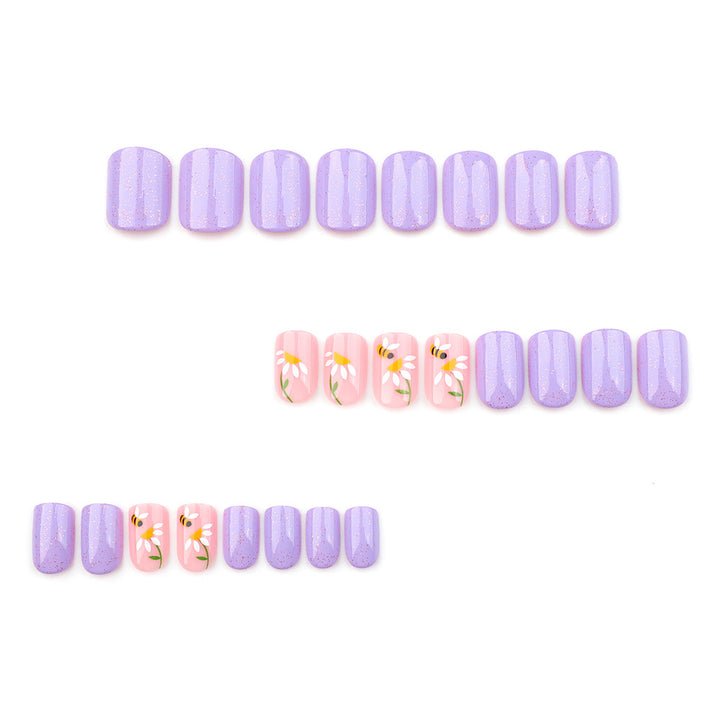 Artfully designed nail extensions with flower design Bowlift