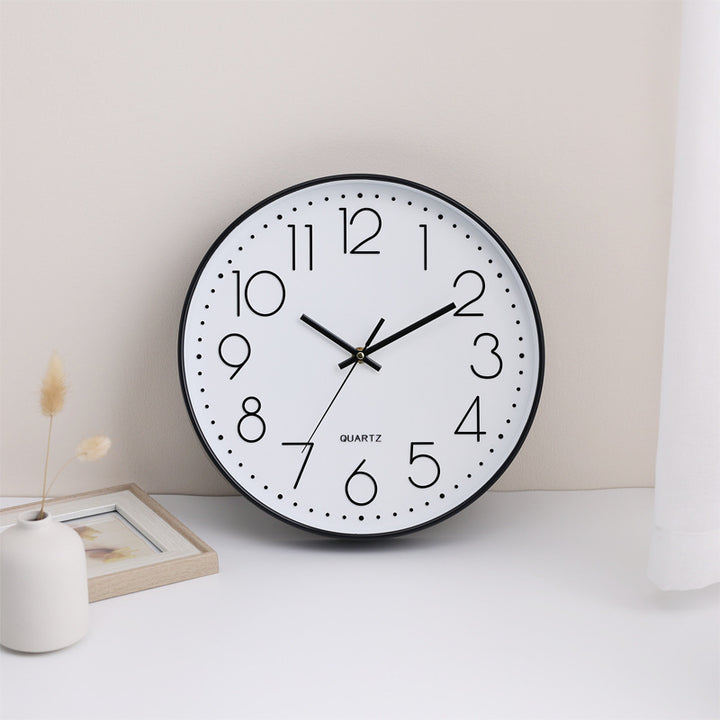 Wall clock in minimalist design Bowlift