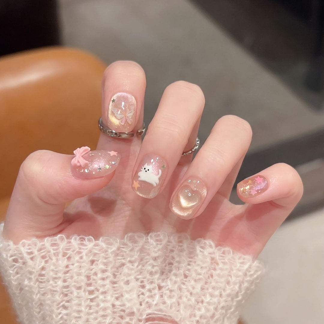 Whimsical Press-On Nail Art Set with Playful Character Designs Bowlift