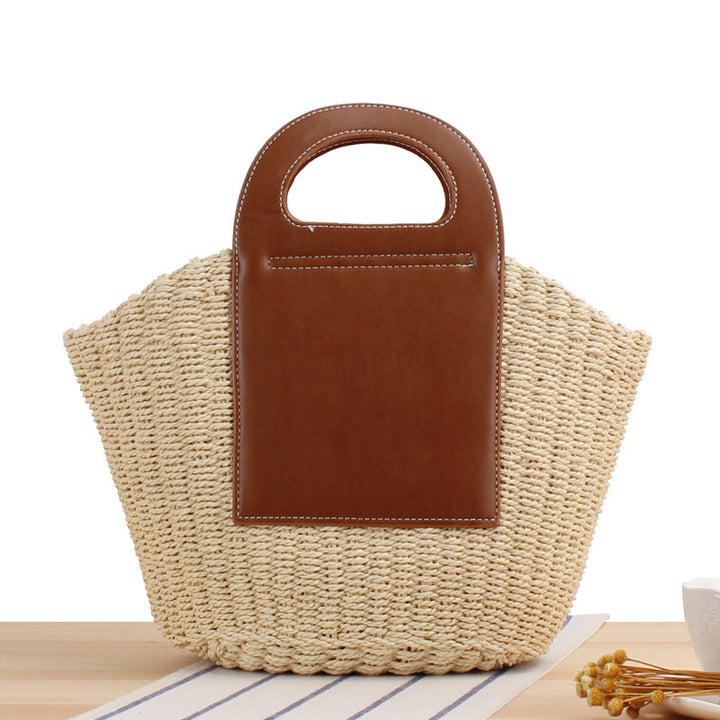 Tote bag made of braided natural material with elegant leather back Bowlift