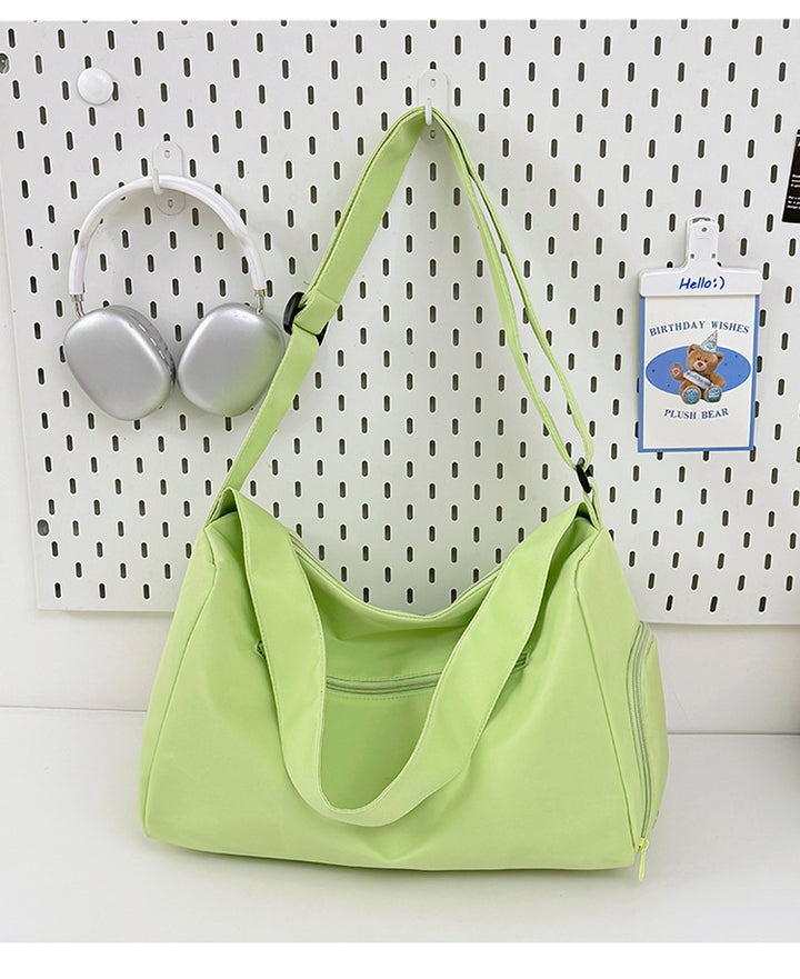 Sporty shoulder bag with spacious interior and sturdy carrying strap Bowlift