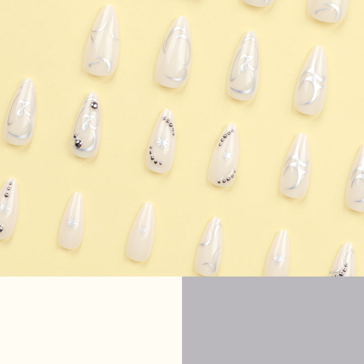 Artistic acrylic nails with elegant glitter patterns Bowlift