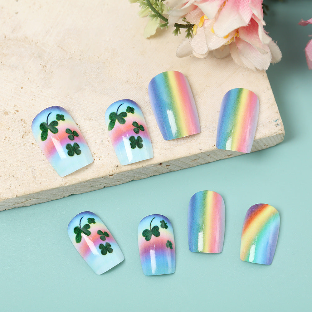 Artificial nails with colorful rainbow and clover leaf designs Bowlift
