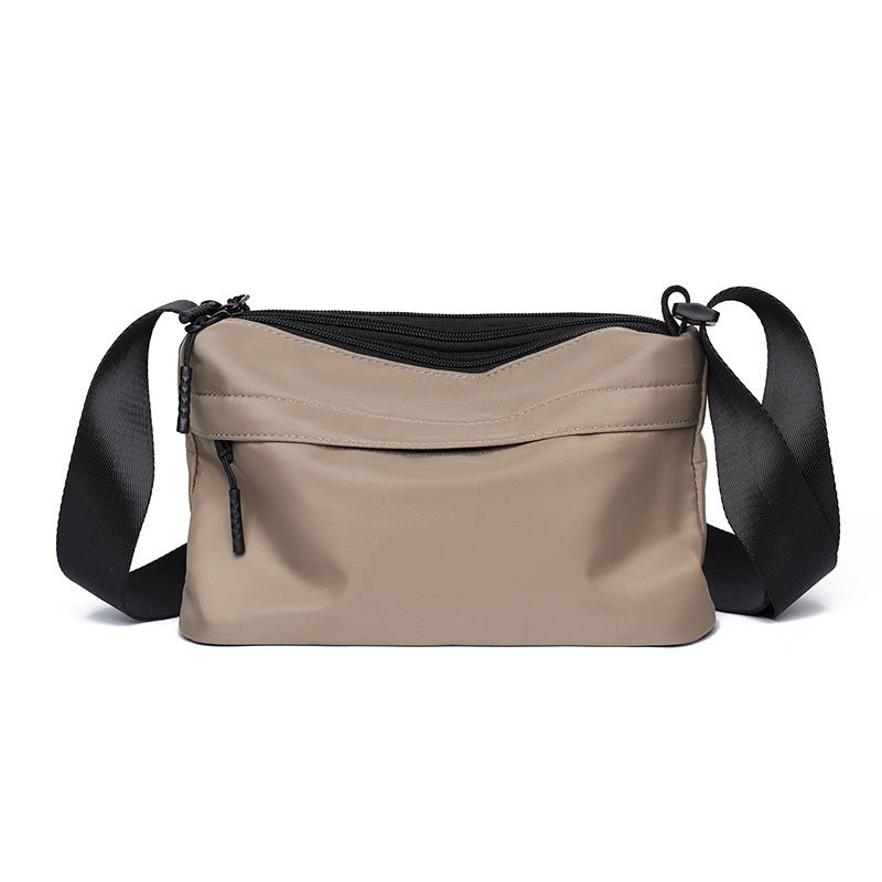 Practical shoulder bag with multiple compartments Bowlift