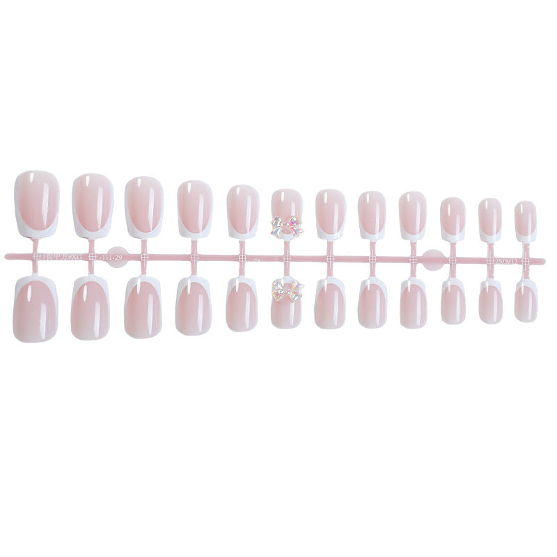Elegant Glossy Press-On Nails with Jewel Accents Bowlift