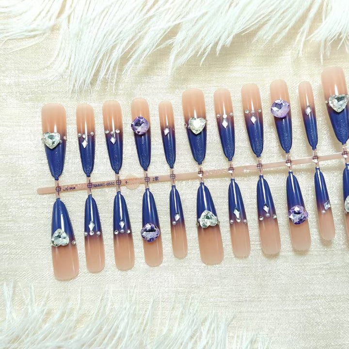 Artificial nails with elegant glitter design and 3D rhinestone accents Bowlift