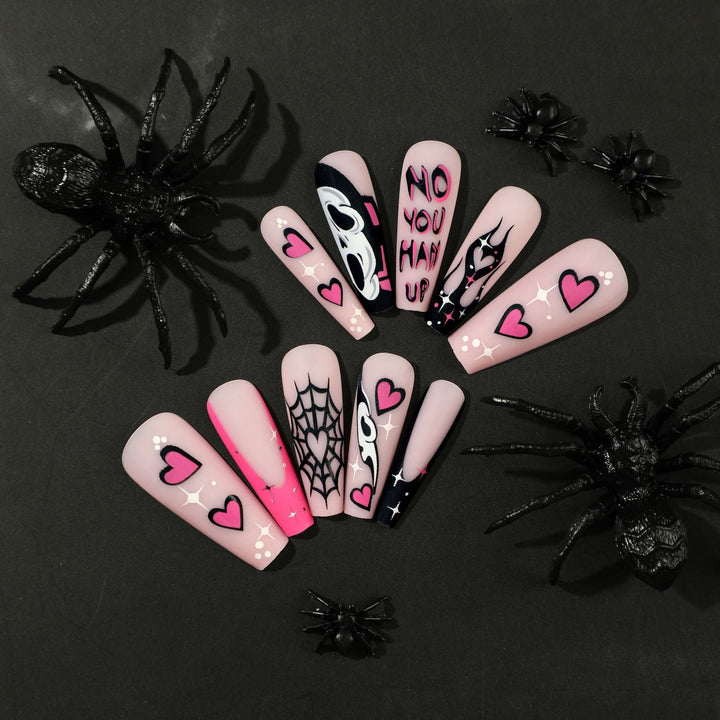 Artificial nail art with Halloween motif and unique embellishments Bowlift