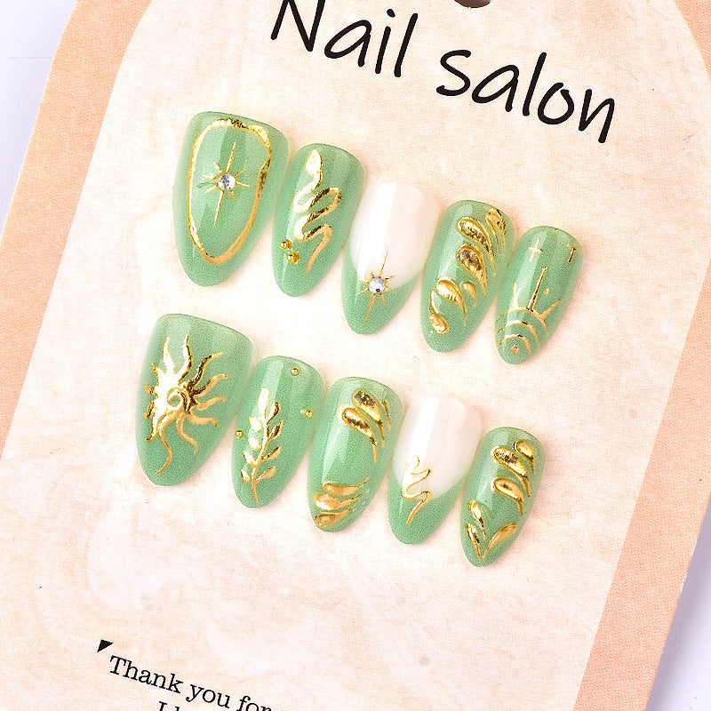 Artificial nails with elegant gold design Bowlift