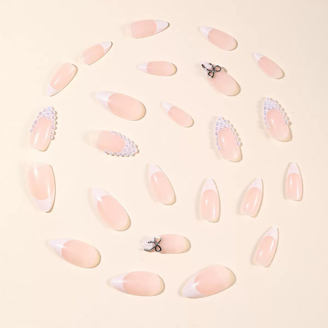 Acrylic nail set with elegant pearl and bow decorations Bowlift