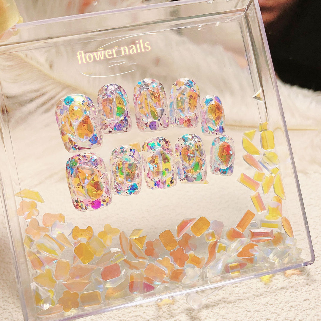 Artful nail tips with glitter accents Bowlift