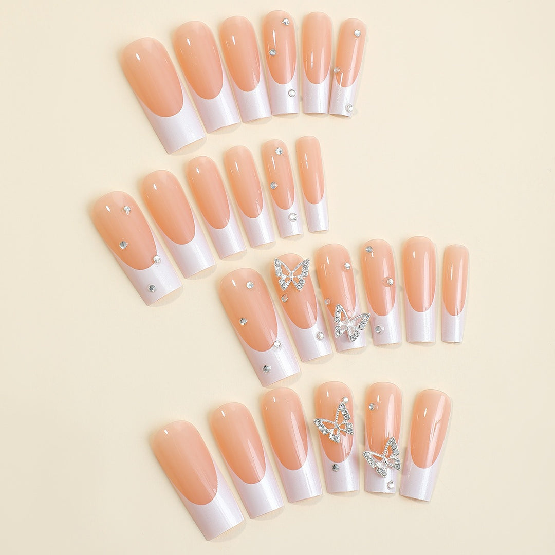 Artificial nail set with luxurious glitter and delicate floral designs Bowlift