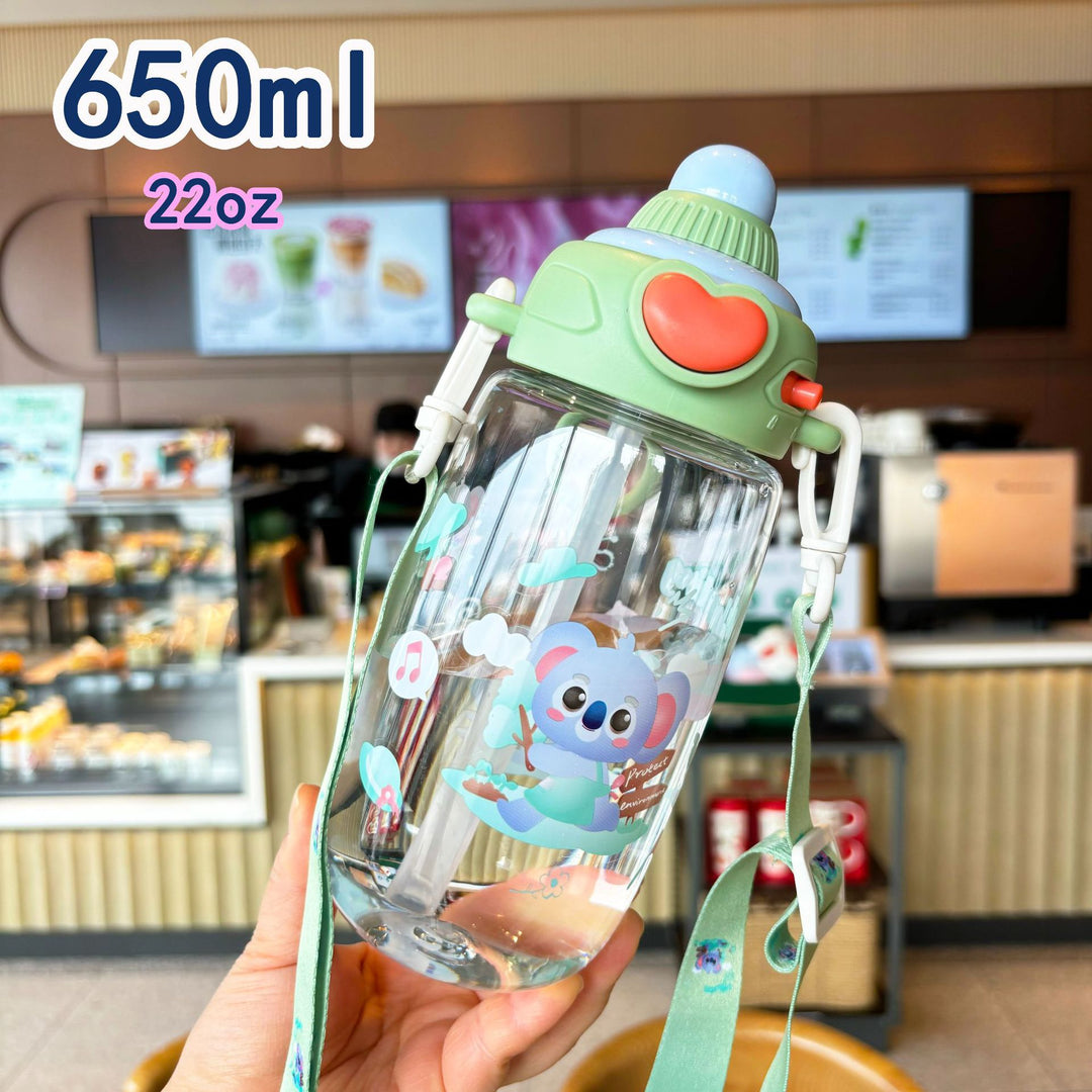 Women's transparent drinking bottle with ergonomic carrying handle and integrated straw Bowlift