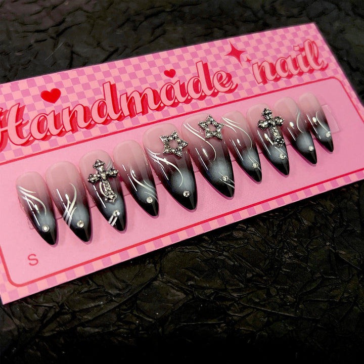 Artistic stiletto nails with elegant glitter design Bowlift