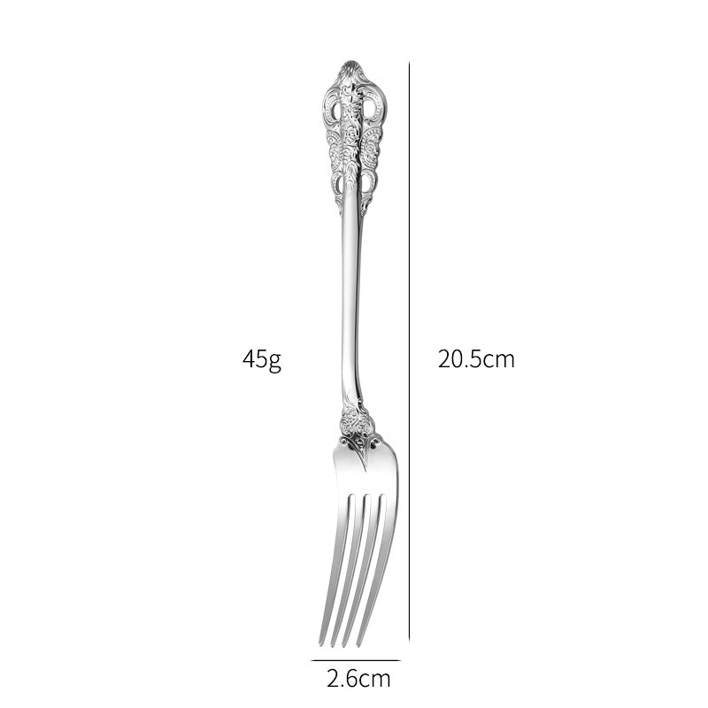 Elegant fish fork with artistic handle design Bowlift