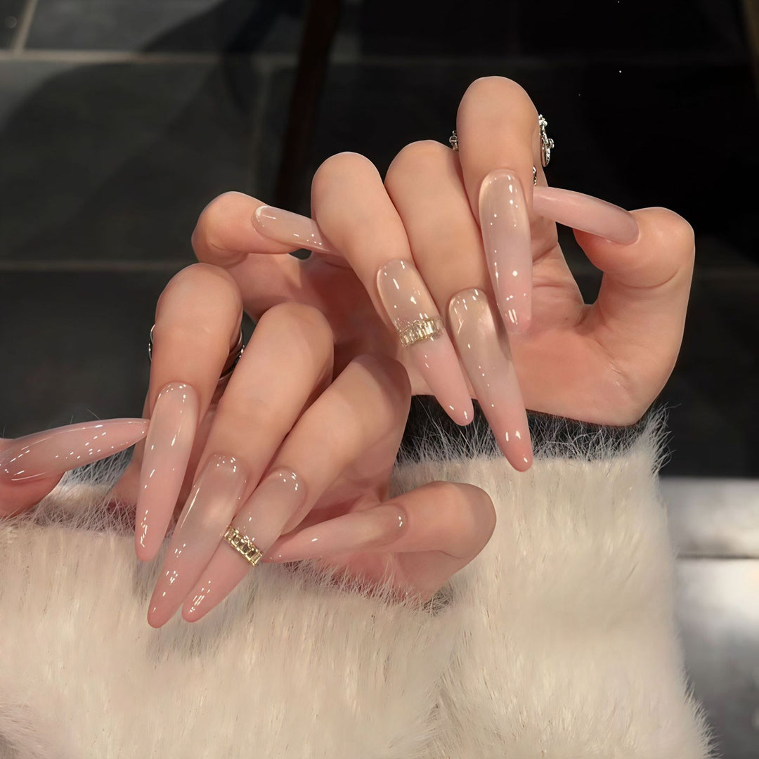 Glamorous artificial nails with elegant glitter and rhinestone application Bowlift