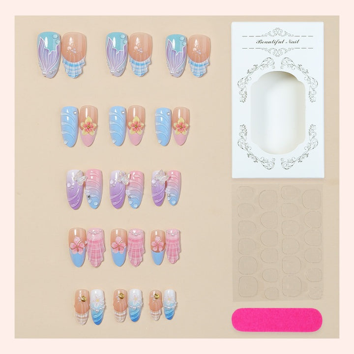 Creative nail art set with floral and colorful accents Bowlift