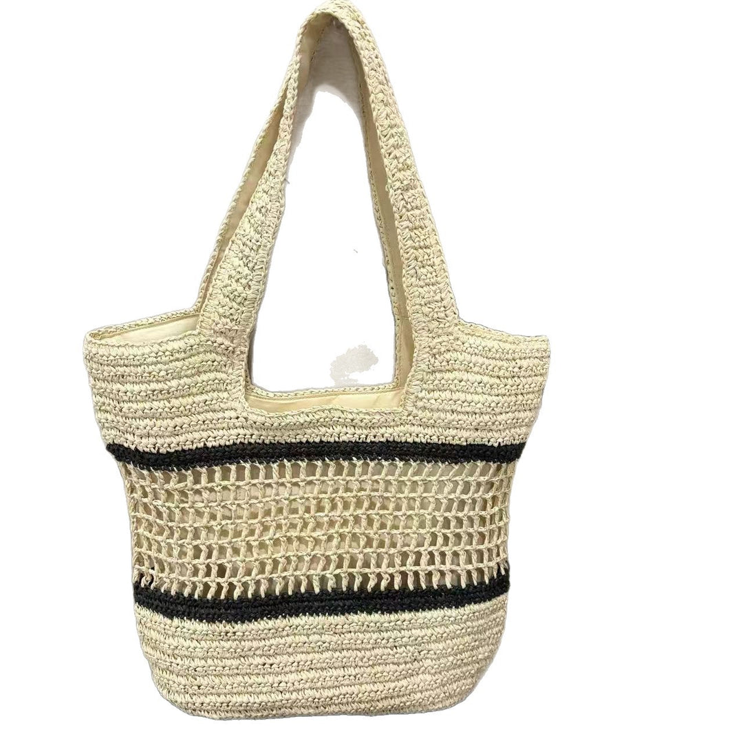 Woven natural material handbag with elegant structure Bowlift