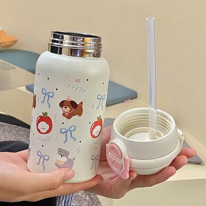 Women's stainless steel water bottle with innovative safety closure Bowlift