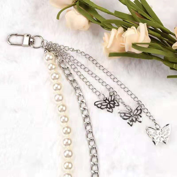 Fashionable belt with pearl and chain pendants Bowlift