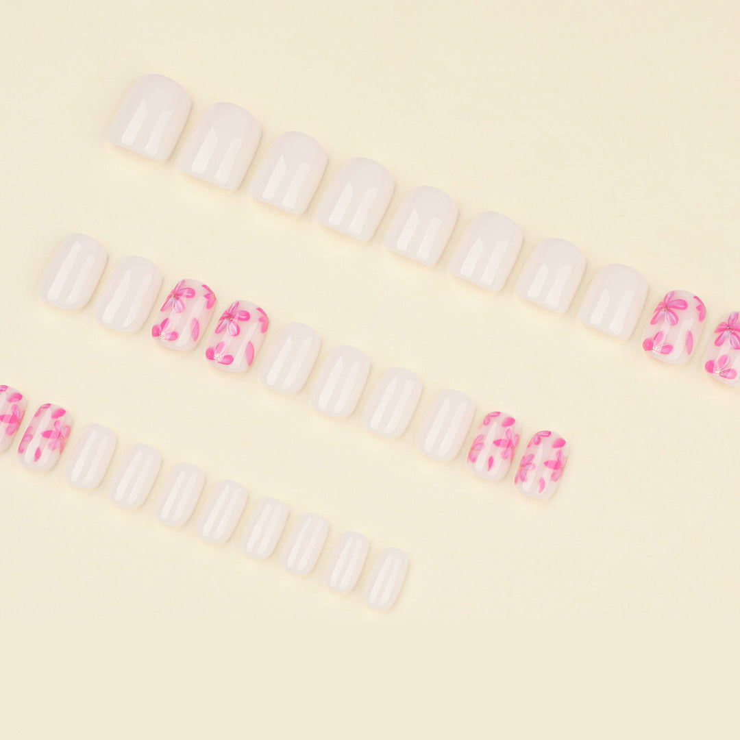 Stylish artificial nail design with floral accents Bowlift