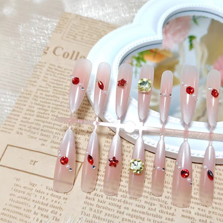 Artificial nails with sparkling 3D decorations Bowlift