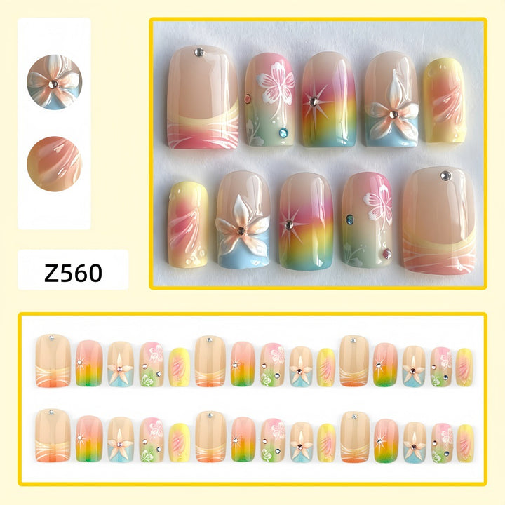 Acrylic nails with floral accents and gradient Bowlift