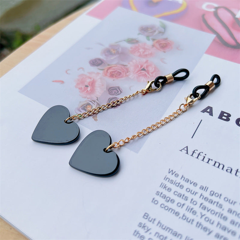 Heart-Shaped Dangle Earrings with Golden Chain Bowlift