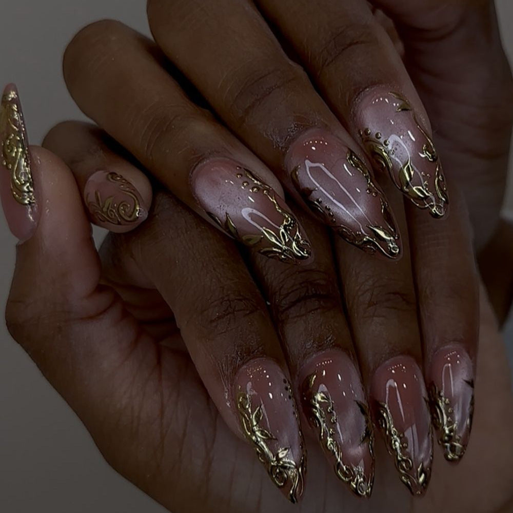 Exquisite artificial nails with golden decorations Bowlift