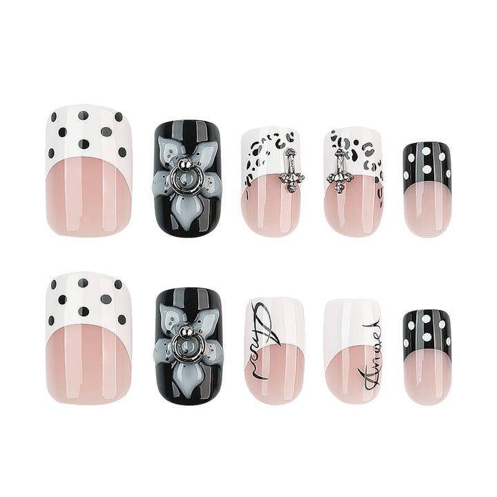 Artful nail extensions with elegant black-and-white design Bowlift