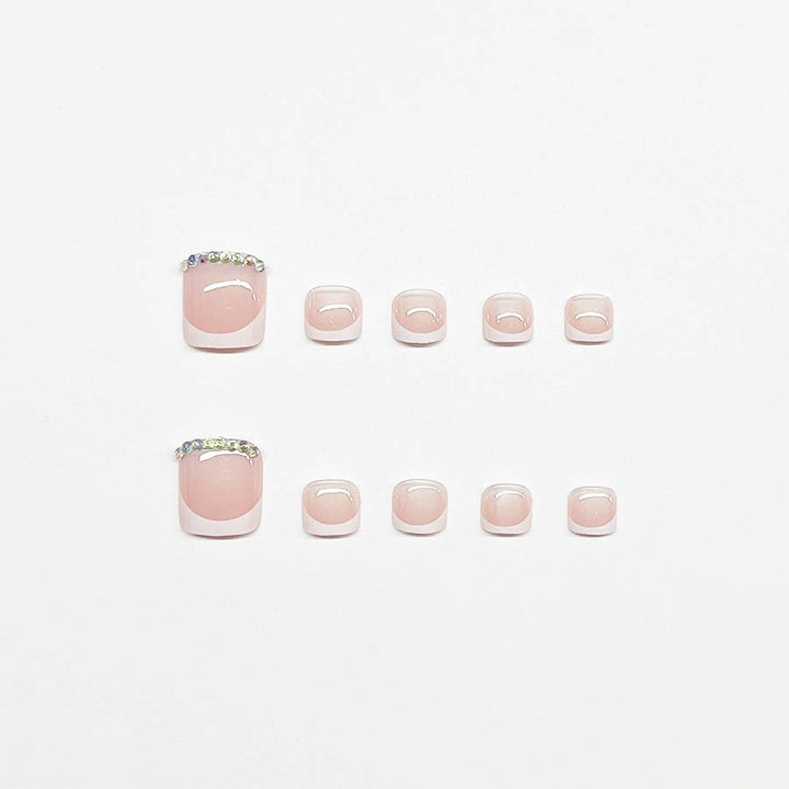 Nail art set with elegant French design and sparkling accents Bowlift