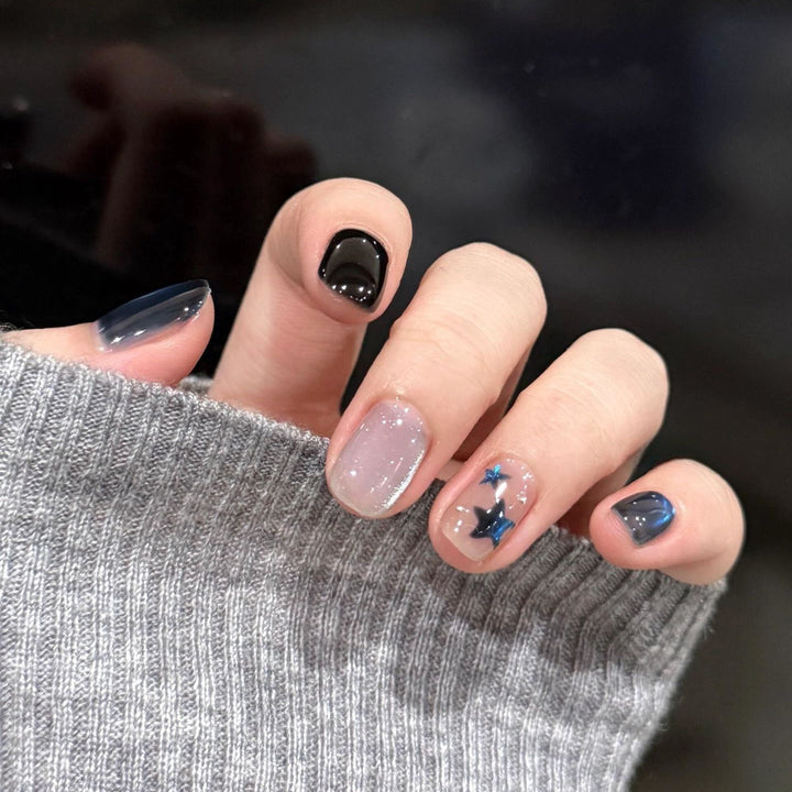 Artificial nails with elegant star design and shimmering effects Bowlift