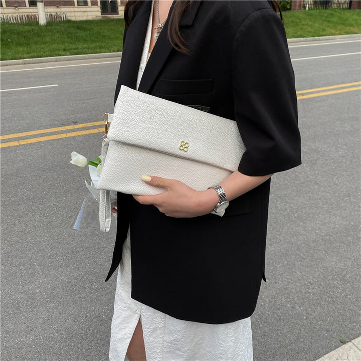 Elegant Textured Wristlet Clutch Bowlift