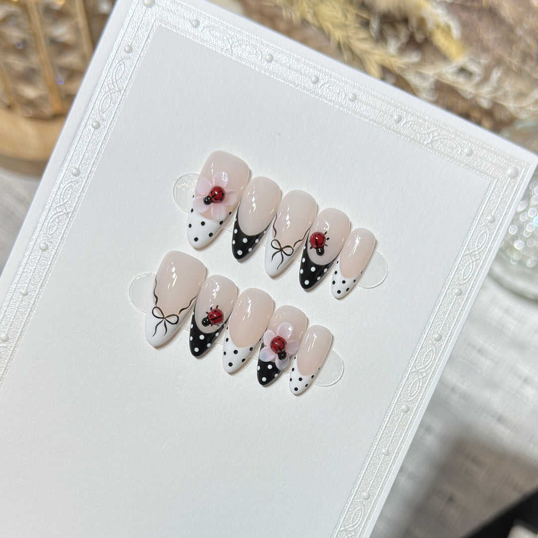 Artistic Stiletto Press-On Nail Set with Floral and Insect Designs Bowlift