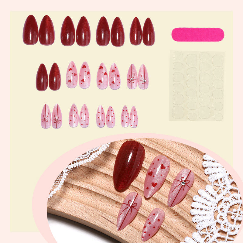 Artificial nail set with romantic heart and glitter designs Bowlift