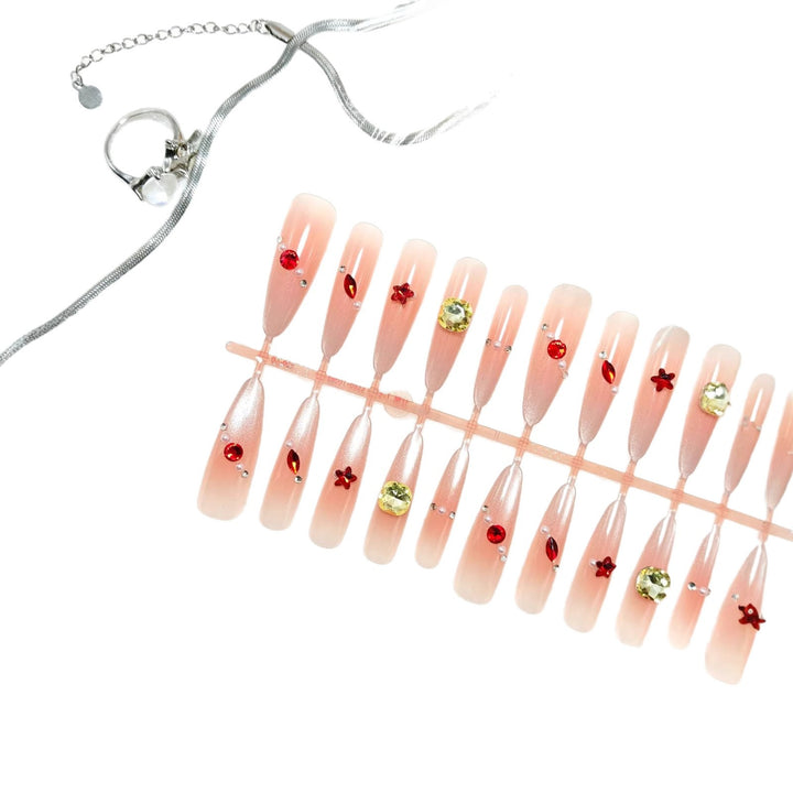 Artificial nails with sparkling 3D decorations Bowlift