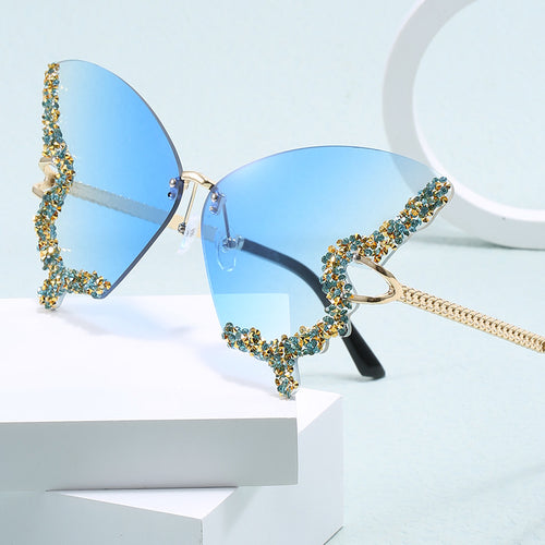 Ladies extravagant Cats Eye sunglasses with sparkling accents Bowlift