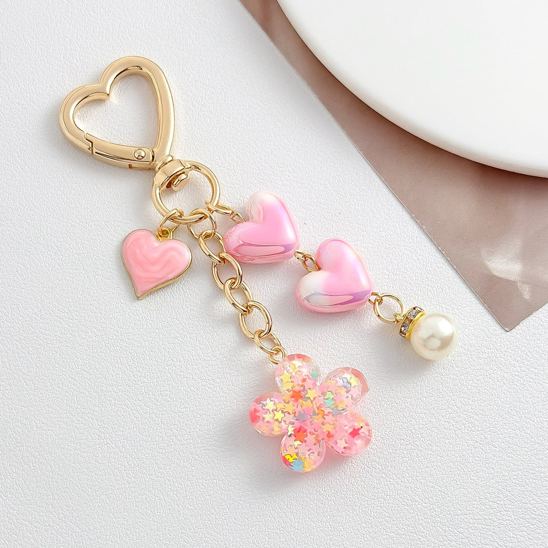 Playful keychain with hearts and flower motif Bowlift