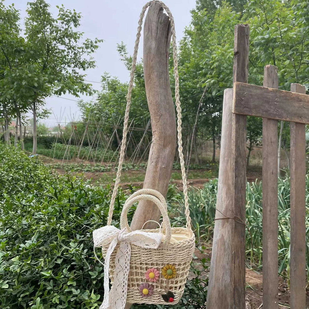 Playful basket bag with floral accents Bowlift