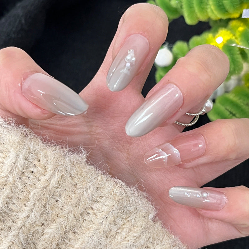 Glossy Nail Art Set with Sparkling Glitter Accents Bowlift