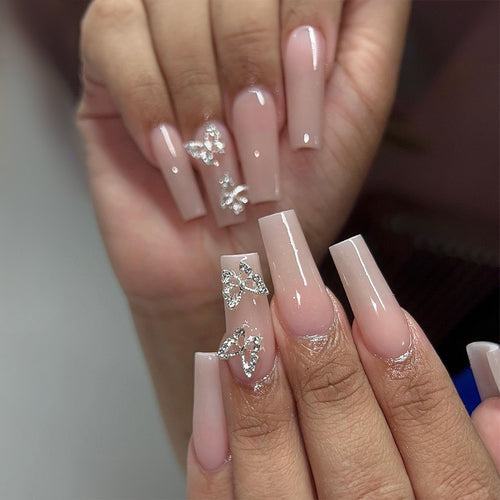 Artificial nails with butterfly accents and rhinestone decorations Bowlift