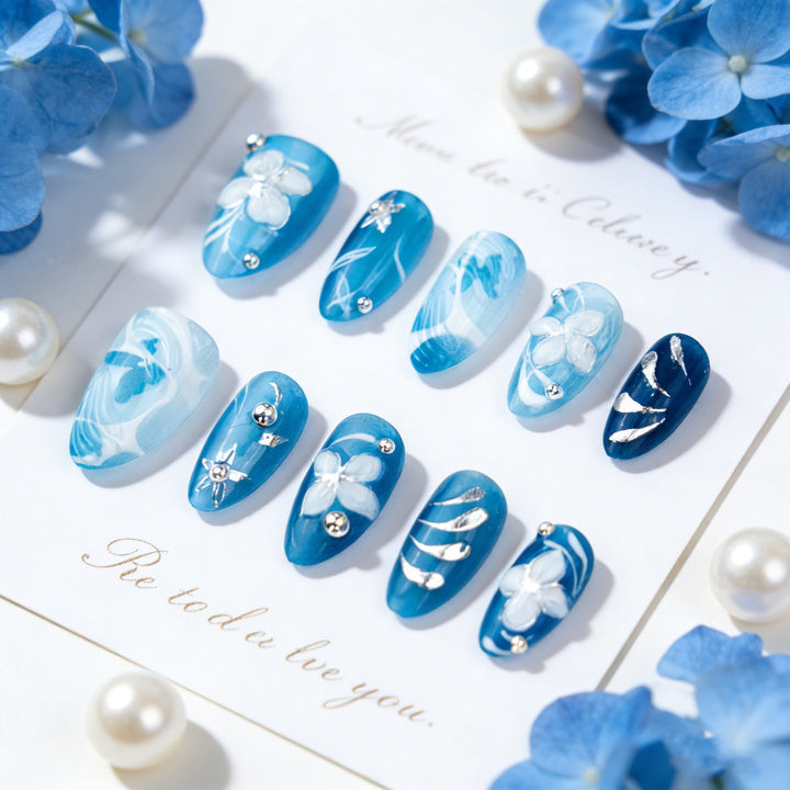 Artificial nail set with floral accents and elegant glitter elements Bowlift