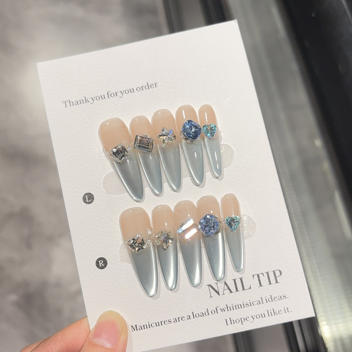 Glamorous artificial nails with sparkling stones Bowlift